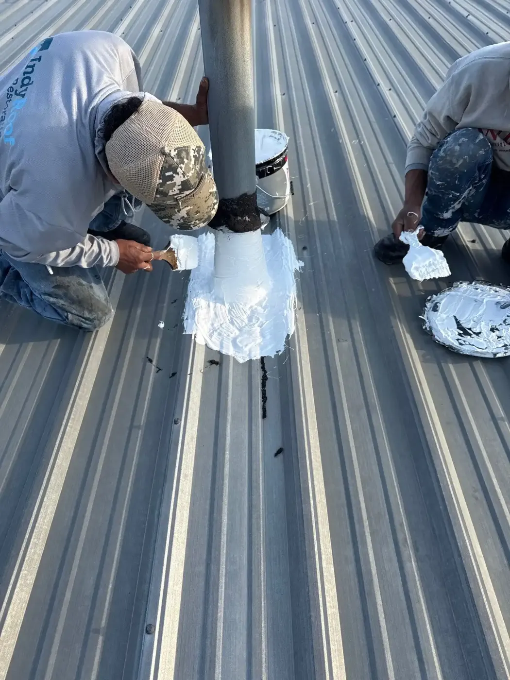 Tarping and dry-in on a Oaklandon commercial roof